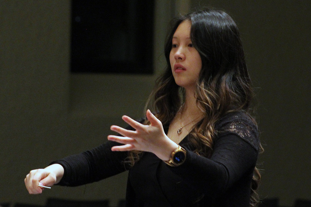 Music Major Megan DelSignore conducts the Loyola Wind Ensemble